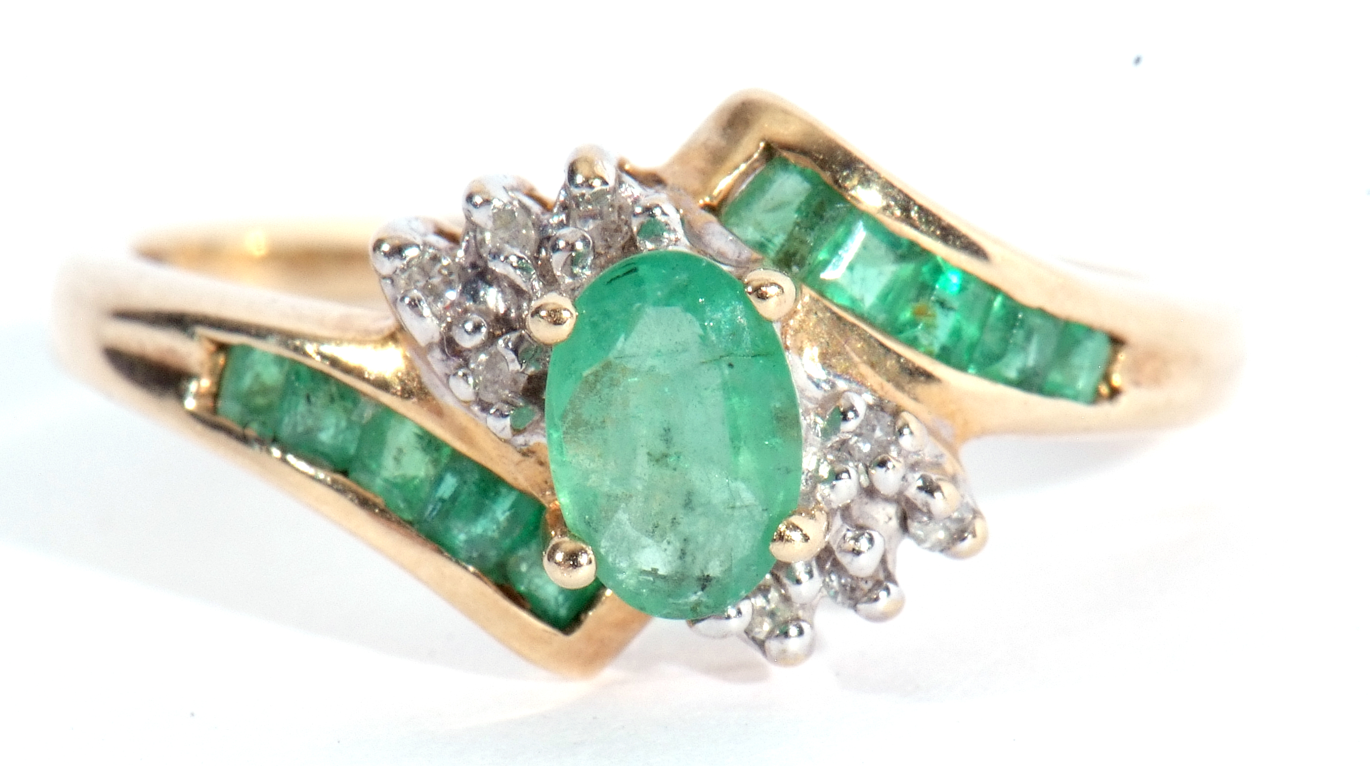 Modern 10K stamped diamond and synthetic emerald cluster ring, centring an oval faceted stone - Image 2 of 7