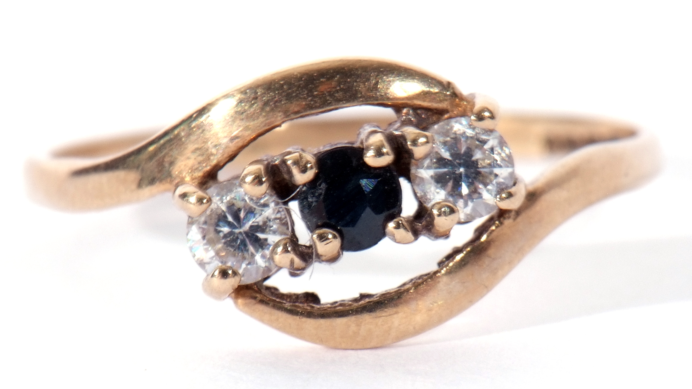 Modern 9ct gold diamond and sapphire cross over ring featuring a round cut sapphire between two - Image 2 of 9