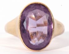 Antique 18ct gold amethyst dress ring, the large oval faceted amethyst 15 x 10mm in a rub over