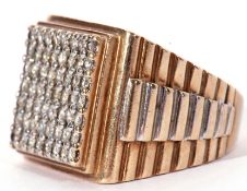 9ct large designer ring, the rectangular shaped stepped panel 20 x 18mm set with 56 small