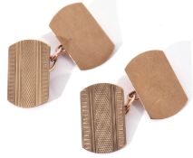 Pair of 9ct gold cuff links of rectangular shaped design, one panel with engine turned decoration,