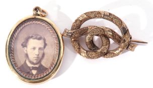 Mixed Lot: antique gold plated pendant mourning locket of oval shape, glazed photograph panel, the