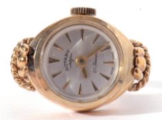 Vintage Rotary ring watch, the round silver dial with gold coloured batons and hands, dial marked "