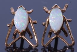 Pair of 9ct gold and opal fly set earrings, post fittings