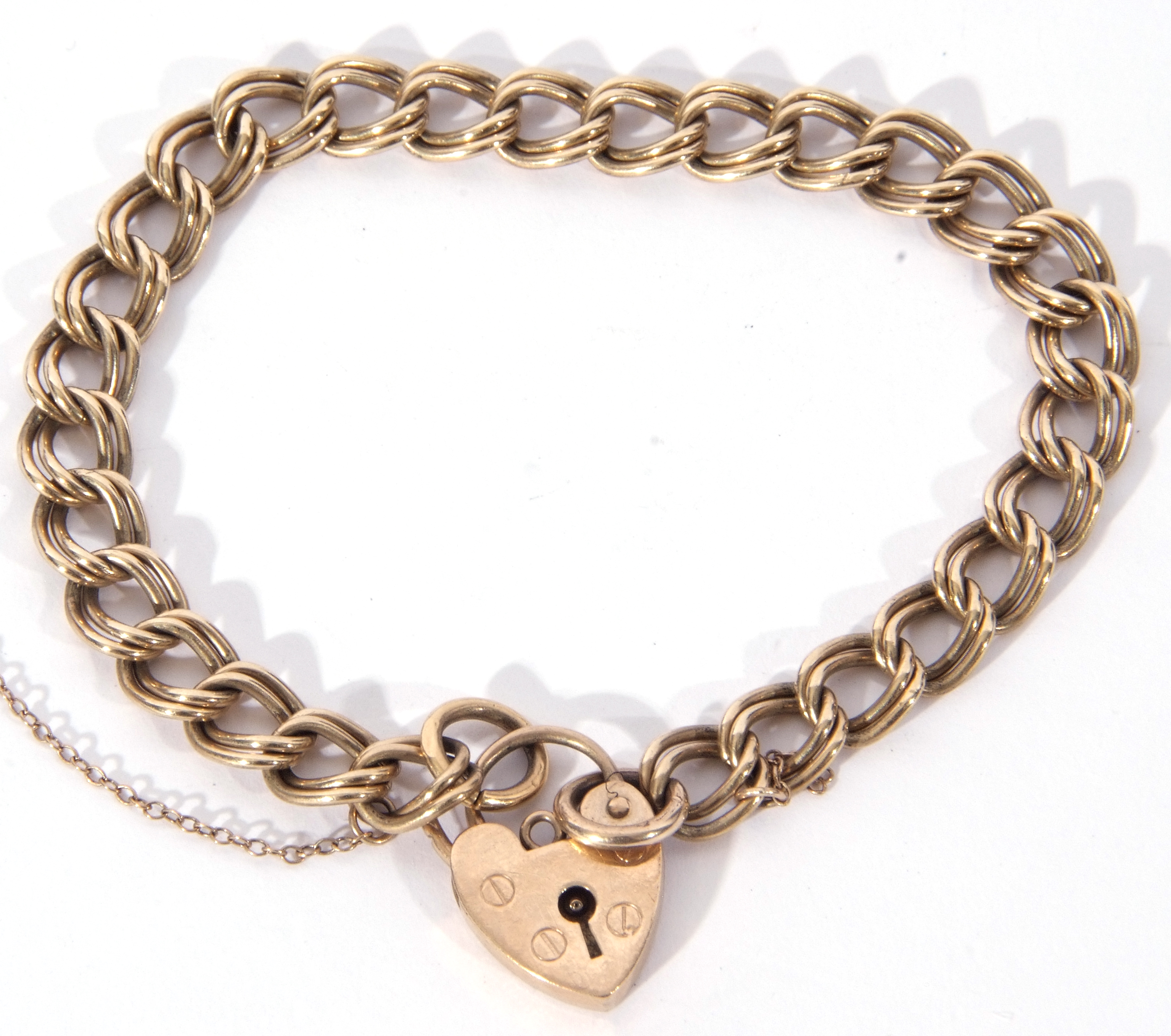 9ct gold bracelet, a design featuring double over links to a heart padlock, 19.5cm long, 12.5gms
