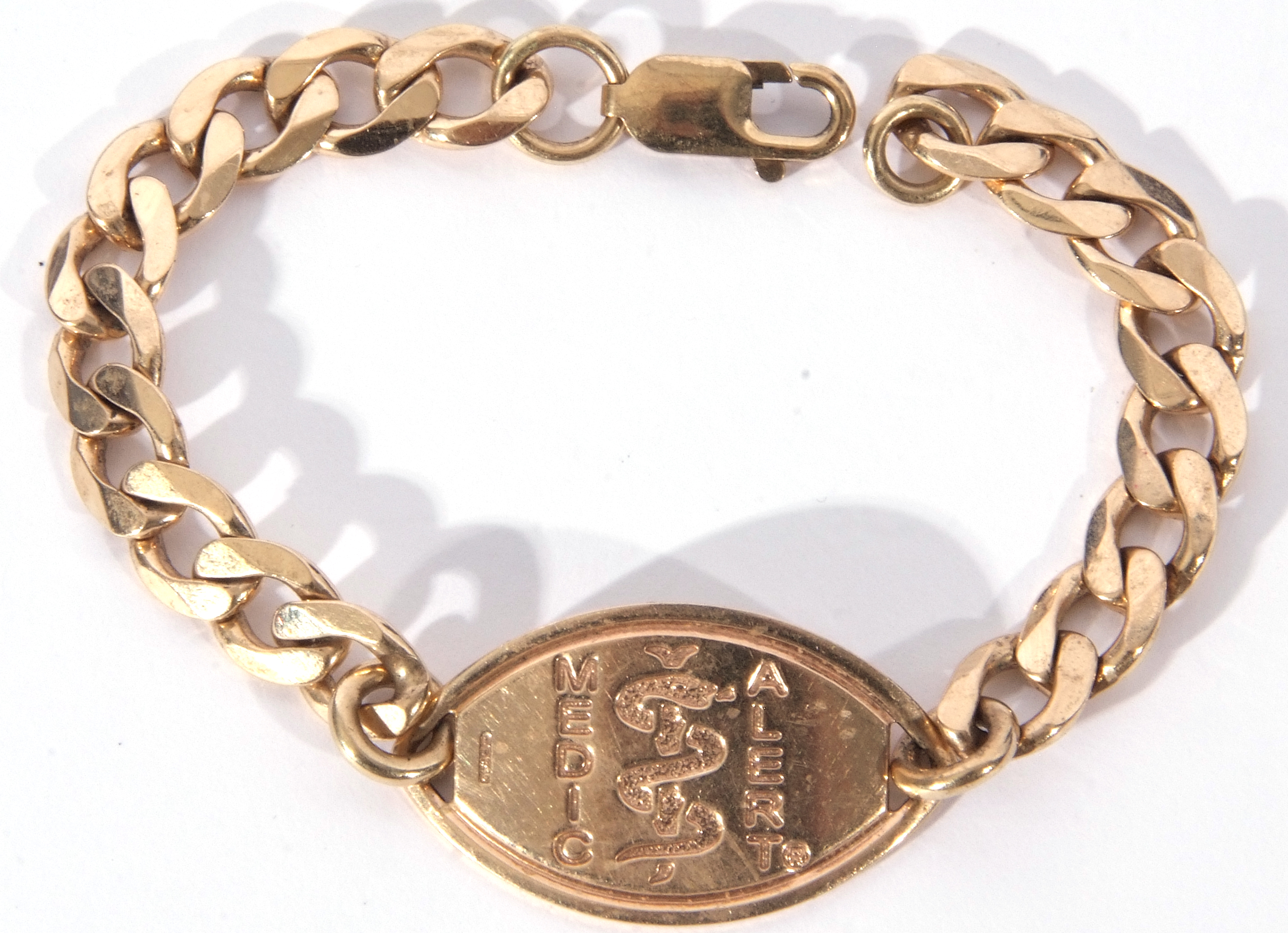 9ct gold Medic Alert bracelet, the oval panel engraved verso with allergies, to a flattened curb - Image 2 of 2