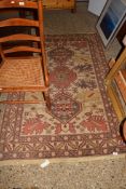 20TH CENTURY CAUCASIAN WOOL FLOOR RUG, DECORATED WITH LARGE CENTRAL PANEL OF MEDALLIONS AND