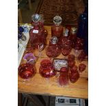 COLLECTION OF CRANBERRY GLASS ITEMS TO INCLUDE DECANTERS, DRINKING GLASSES, JUGS, SUGAR SIFTER ETC