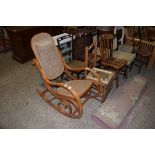 MODERN BENTWOOD CANE SEATED AND BACK ROCKING CHAIR