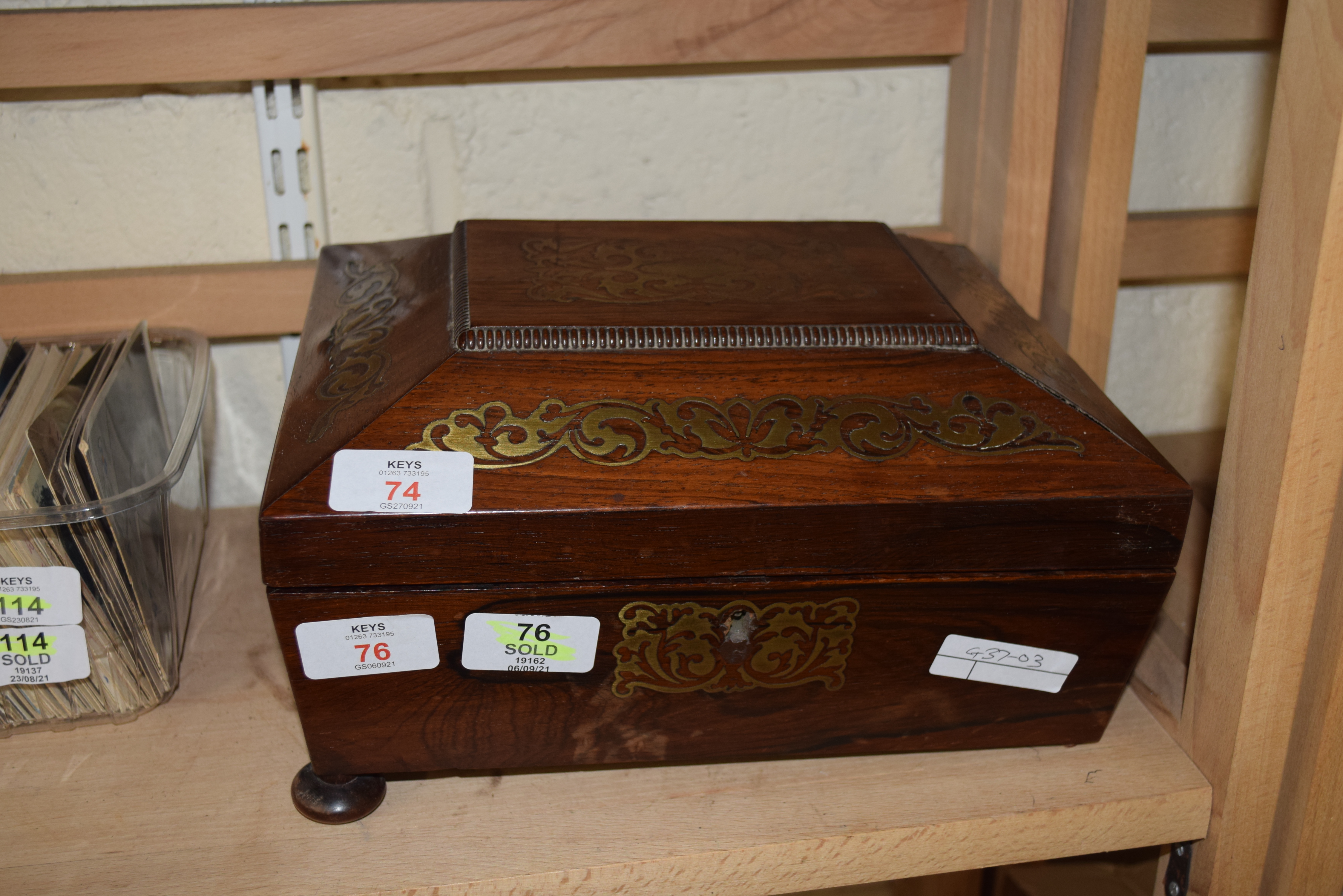 19TH CENTURY ROSEWOOD AND BRASS INLAID BOX OF SARCOPHAGUS FORM