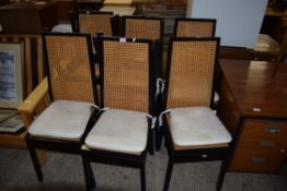 SET OF EIGHT CANE SEATED AND BACKED MODERN DINING CHAIRS
