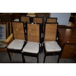 SET OF EIGHT CANE SEATED AND BACKED MODERN DINING CHAIRS