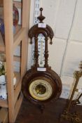 LATE VICTORIAN ANEROID BAROMETER AND THERMOMETER COMBINATION IN FLORAL CARVED FRAME