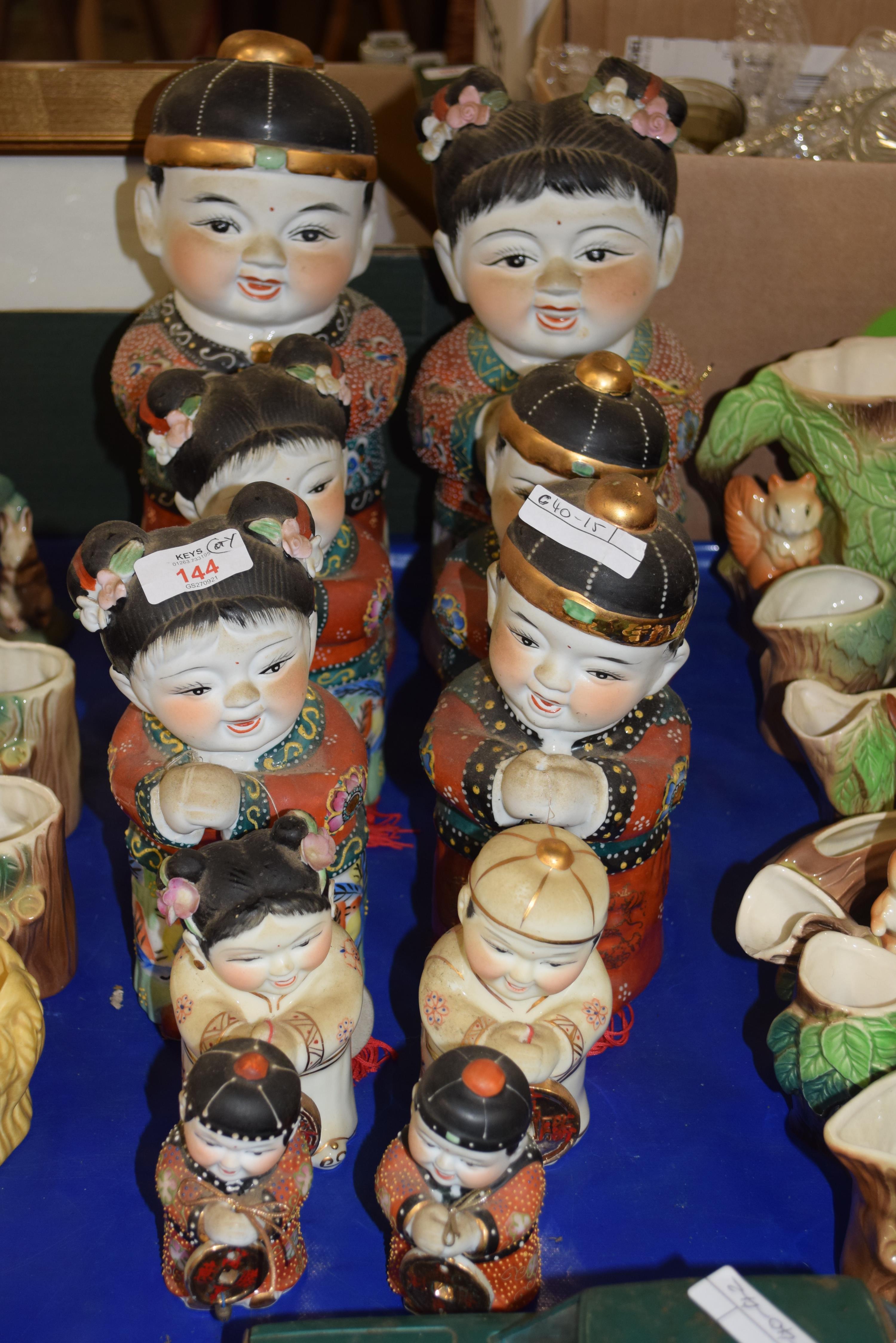 COLLECTION OF TEN CHINESE POTTERY MODELS OF CHILDREN
