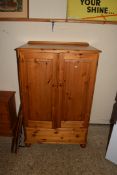 MODERN PINE TALLBOY CABINET WITH TWO PANELLED DOORS OVER A SINGLE DRAWER, 140CM HIGH