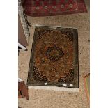 20TH CENTURY MIDDLE EASTERN SMALL RUG OR PRAYER MAT DECORATED WITH LARGE CENTRAL MEDALLION AND