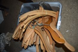 BOX OF WOODEN CLOTHES HANGERS