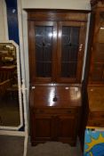 EARLY 20TH CENTURY OAK BUREAU BOOKCASE CABINET WITH LEAD GLAZED TOP SECTION OVER A BASE WITH FALL