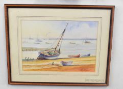 Kenneth Grant, (British, 20th century), A sailboat and small craft beached, watercolour on paper,