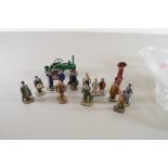 COLLECTION OF DIE-CAST FIGURES AND A DIE-CAST TRACTION ENGINE