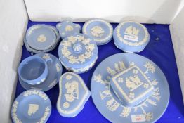 COLLECTION OF WEDGWOOD BLUE JASPERWARE TO INCLUDE ASHTRAYS, CUP AND SAUCER, COVERED TRINKET BOXES