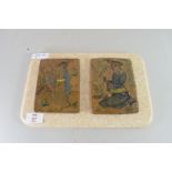 TWO DECORATED TILES POSSIBLY OF INDIAN OF IZNIK OR TURKISH ORIGIN, MOUNTED ON A COMPOSITION STONE