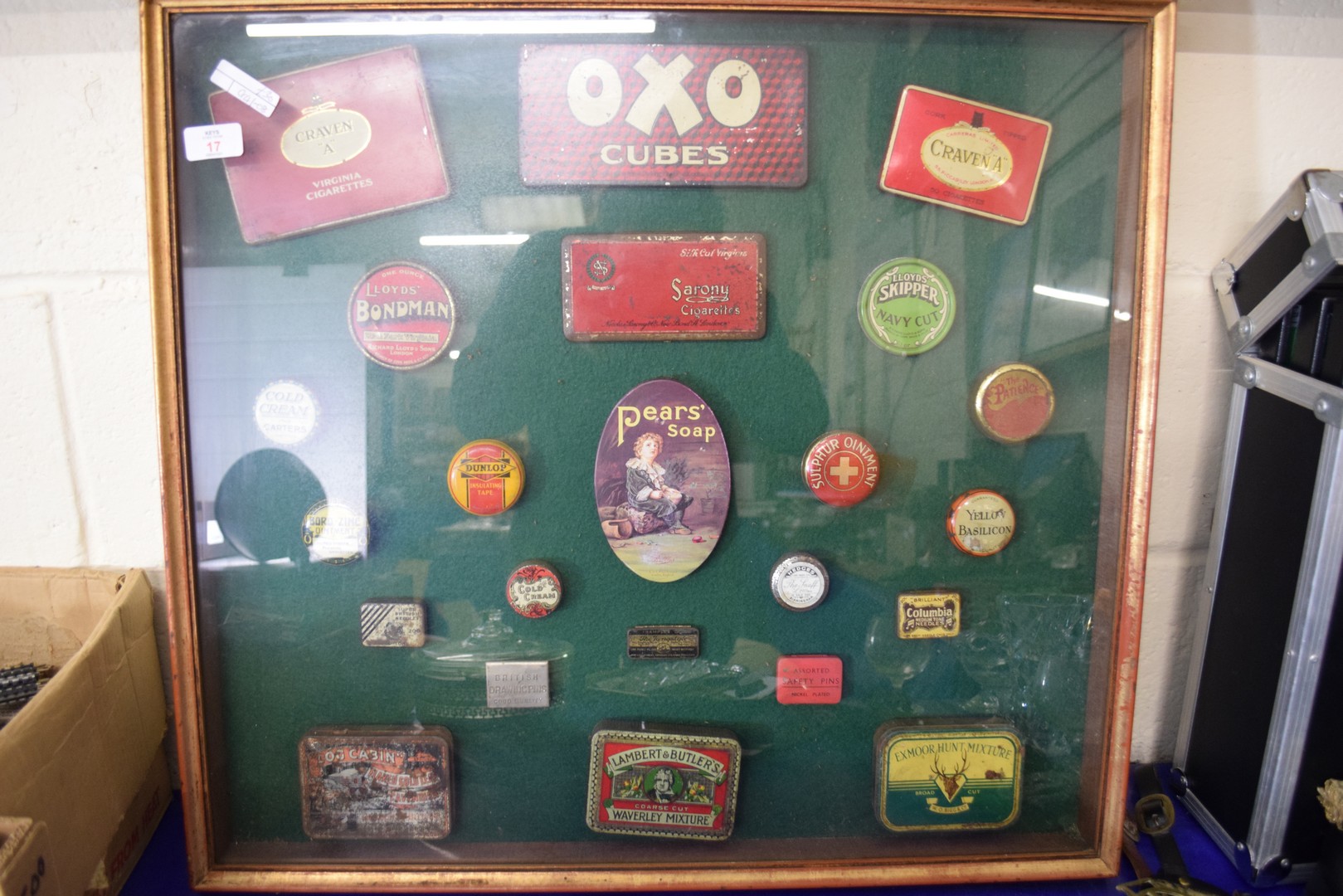 LARGE FRAME CONTAINING VARIOUS VINTAGE TOBACCO AND OTHER TINS