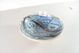 JOHN BUCHANAN, ARCH POTTERY, ST IVES, CORNWALL STUDIO POTTERY DISH DECORATED WITH THREE FISH, 17CM