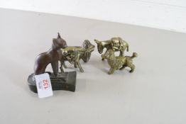 EGYPTIAN BRONZED METAL MODEL OF A CAT, A PAIR OF BRASS DONKEYS AND A PAIR OF BRASS POODLES