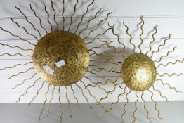 TWO METAL WALL DECORATIONS FORMED AS SUNS