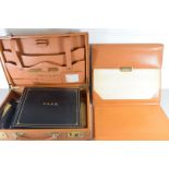 BROWN LEATHER TRAVELLING BRIEFCASE OR STATIONERY CASE CONTAINING VARIOUS NOTEBOOKS, RING BINDER