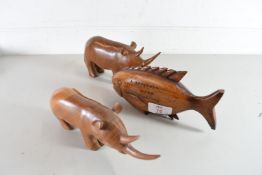 PITCAIRN CARVED WOODEN FISH TOGETHER WITH TWO WOODEN RHINOCEROS