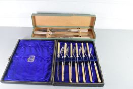 CASED CARVING SET AND A CASED SET OF CUTLERY