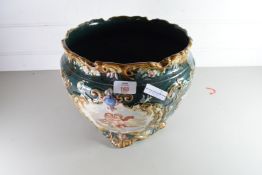 LARGE MAJOLICA TYPE GLAZED JARDINIERE DECORATED WITH CHERUBS, NO 422 TO BASE