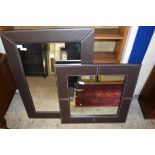 TWO MODERN WALL MIRRORS IN BROWN LEATHER EFFECT FRAMES, LARGEST 94CM HIGH (2)