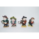 Four 20th century Naples pottery dwarves 9cm in height