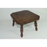 Late 19th century oak four legged milking stool