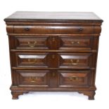 17th century and later oak chest of four drawers, decorated with mitred detail and set with panelled