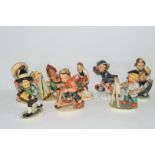 Collection of eight Friedel of Bavaria models of children doing various activities including one