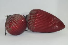 Two red glass Oriental lanterns