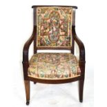 19th century mahogany framed armchair with tapering legs raised on casters, 92cm high Condition: