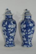 Pair of 19th century Chinese porcelain vases and covers