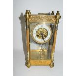 French gilt brass and four glass mounted clock