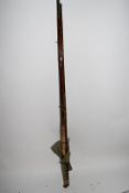 Vintage three-piece fibre glass and cane fishing rod