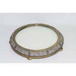 Victorian copper and brass mounted circular mirrored table stand decorated with figural and