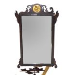 19th century wall mirror in mahogany fret work frame with central gilded roundel detail with bird,