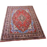 Rich red ground full pile Persian Serouke Carpet, floral medallion design 296cm x 200cm