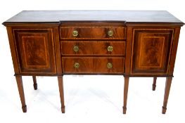 Edwardian mahogany sideboard with three drawers fitted with brass ringlet handles and two panelled