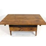 Unusual 20th century stained pine kitchen table, the rectangular top with pegged attachment to a