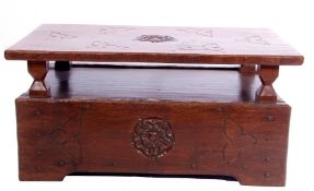 Jack Grimble of Cromer Oak coffee table with drop down storage end, carved with Tudor Rose detail